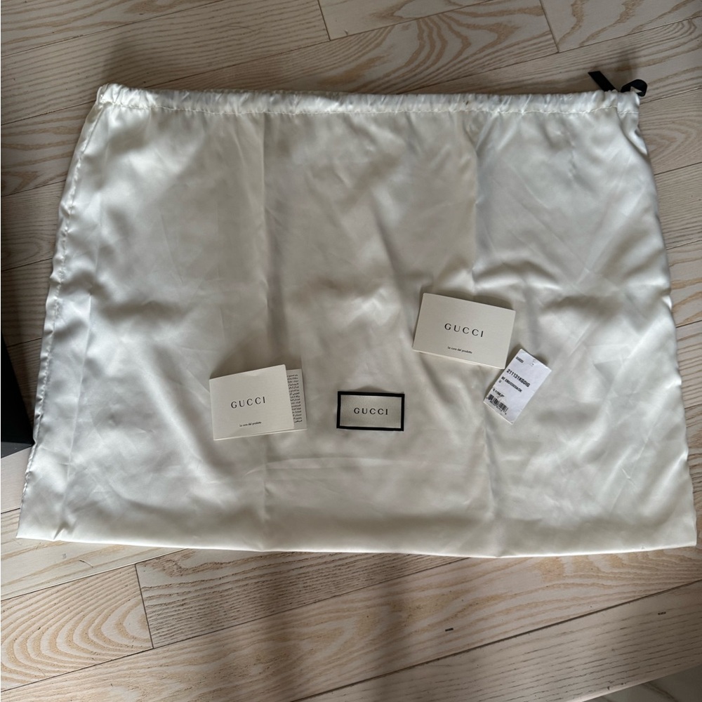 Gucci diaper bag dust cover